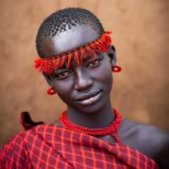 Bodi tribe woman by Eric Lafforgue